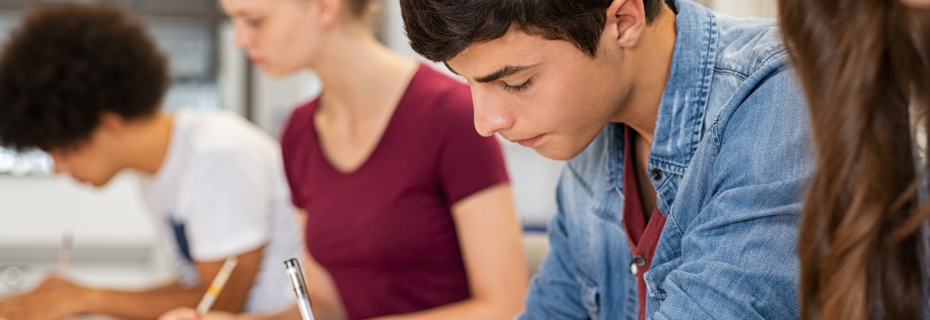 stock image of students writing
